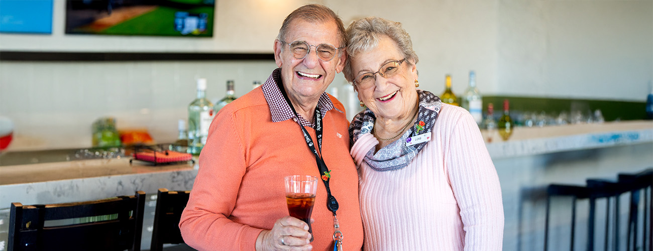 Happy senior couple enjoying life together in a senior living community